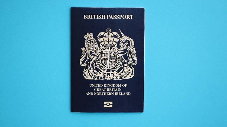 UK passport on a blue background