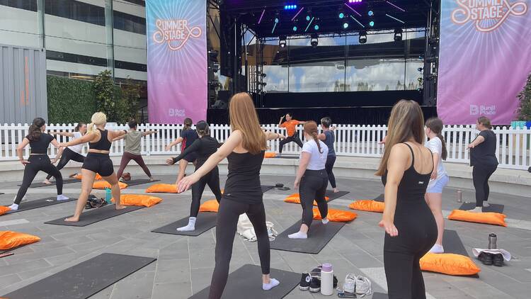 Yoga in front of summer stage