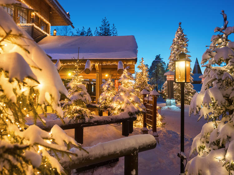 Winter night view of Santa Claus Village in Rovaniemi in Lapland in Finland.