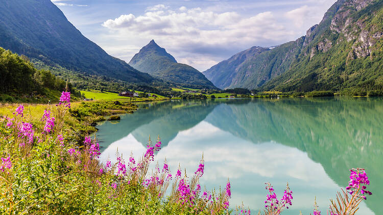 Mountain Eggenipa reflecting in a lake in Gloppen along highway E39 in Sogn og Fjorden county in Norway