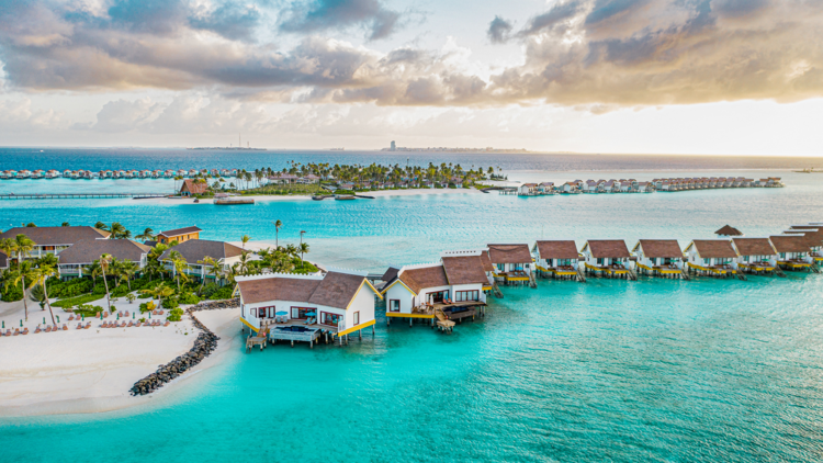 SAii Lagoon Maldives resort huts on the ocean