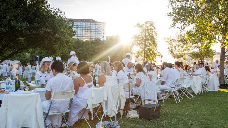 Guests in all-white at Le Dîner en Blanc.