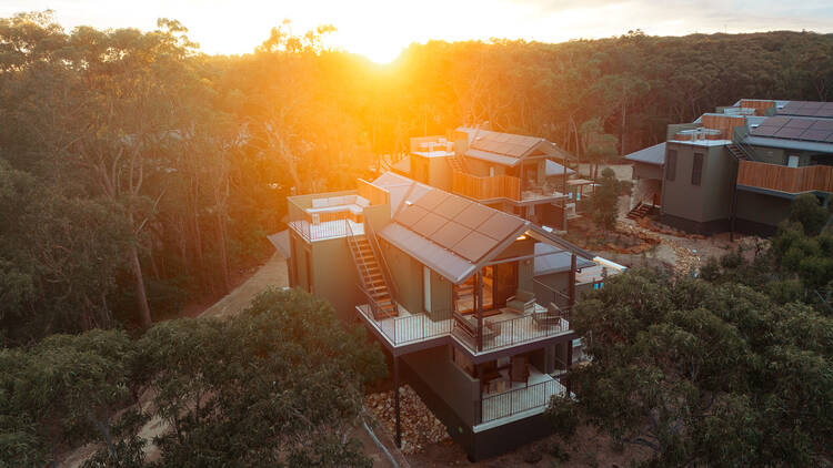 Cabin in bush at sunset