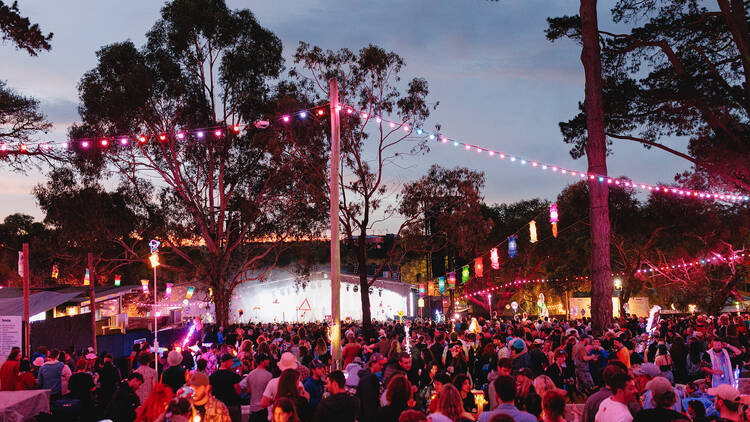 A crowd of people in front of a stage