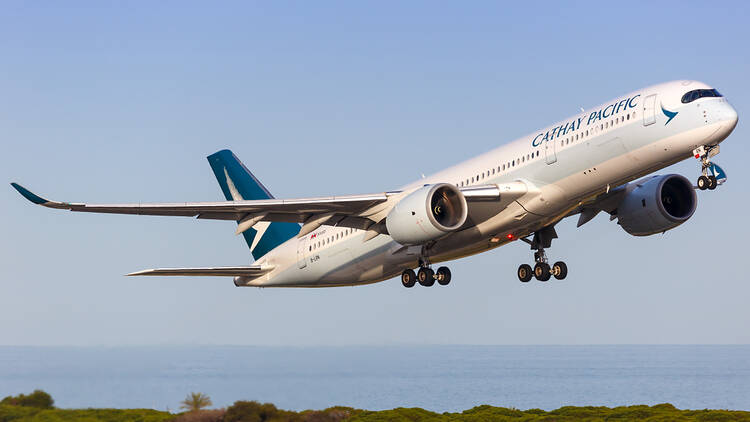 Cathay Pacific airbus taking off in Barcelona