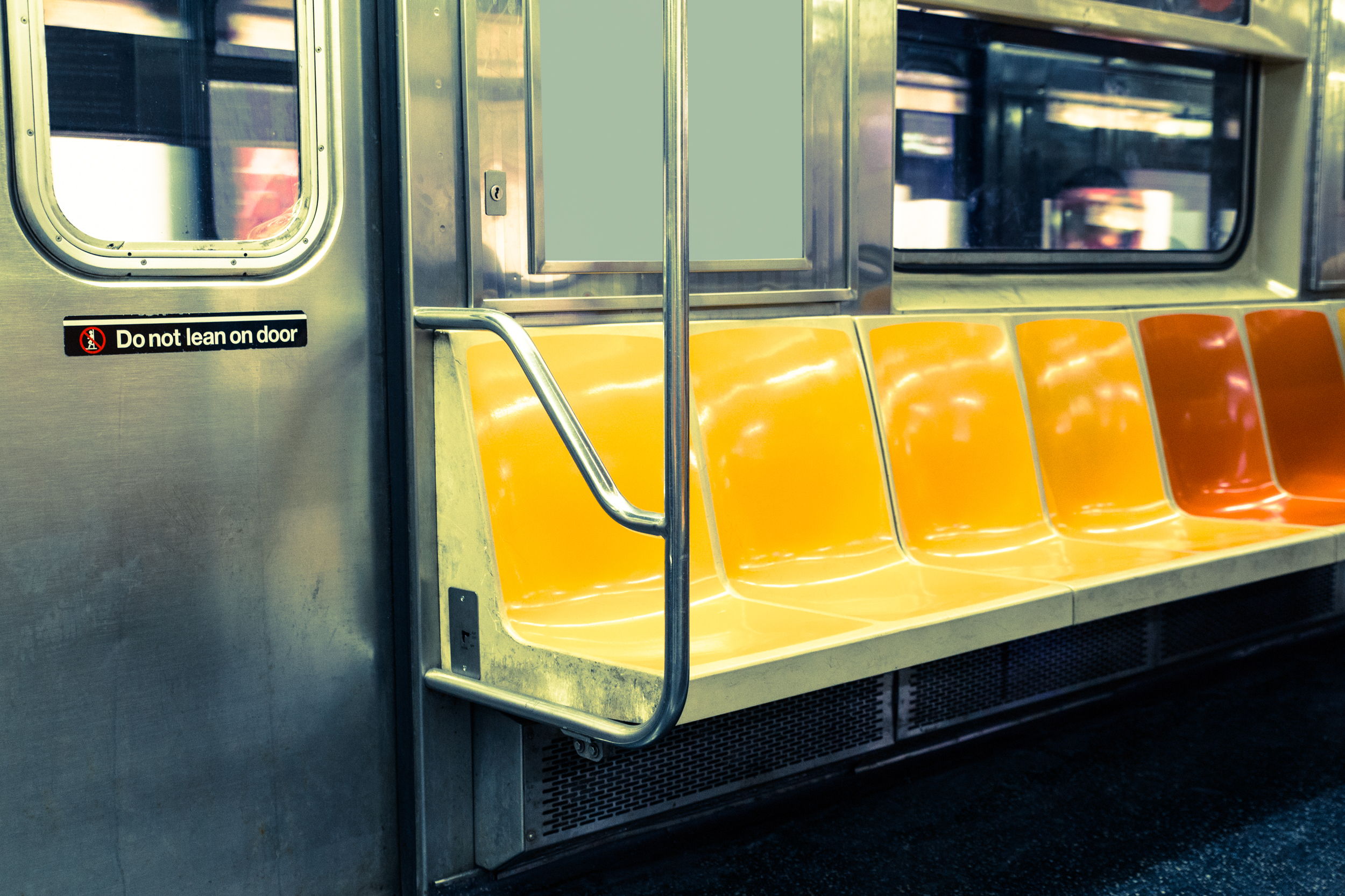 New Yorkers react to the retirement of the iconic yellow and orange subway seats