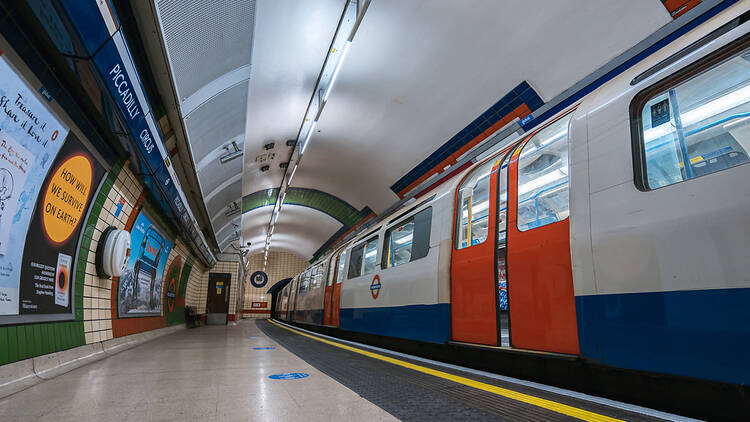 A Piccadilly line train at Piccadilly Circus station in London