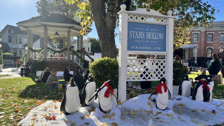 The gazebo and Stars Hollow sign at Warner Bros. Studio Tour Holidays Made Here.