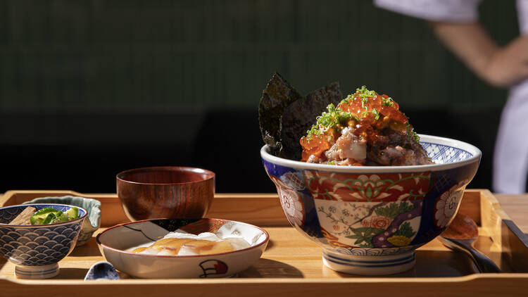 A wooden tray of kaisen-don