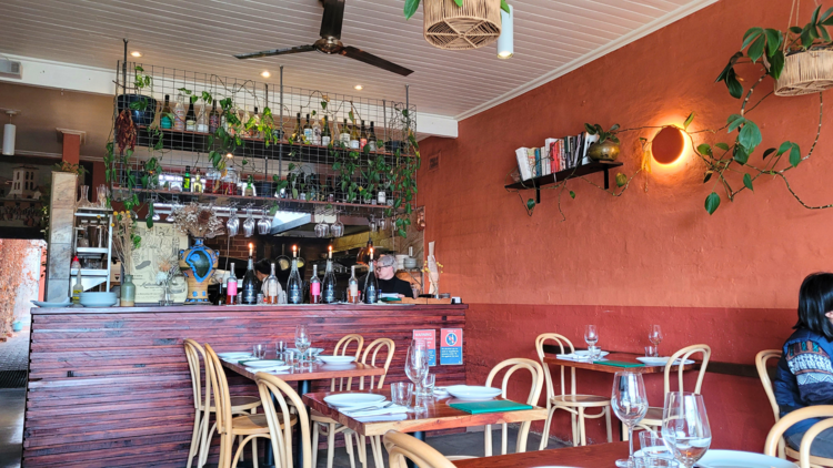 A restaurant with terracotta walls