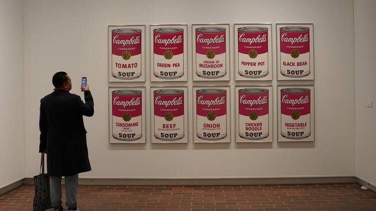 Copenhagen, Denmark - November 16 2022 : Visitor take a picture of the iconic works of artist Andy Warhol at Louisiana Museum of Modern Art