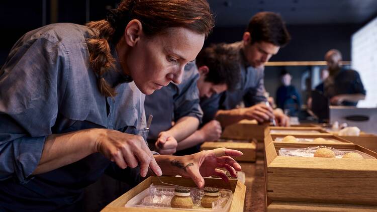 Shot during service at Alchemist. Plating of the impression Smokey Ball.