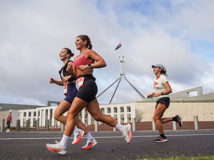 Runners in front of Parliament House