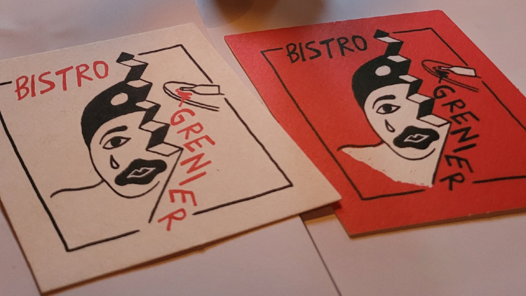 Drink coasters that say: BISTRO GRENIER