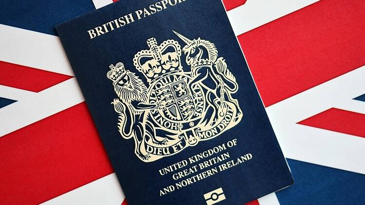 UK British passport document on a Union Jack