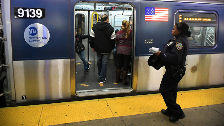 NYPD police in the subway platform