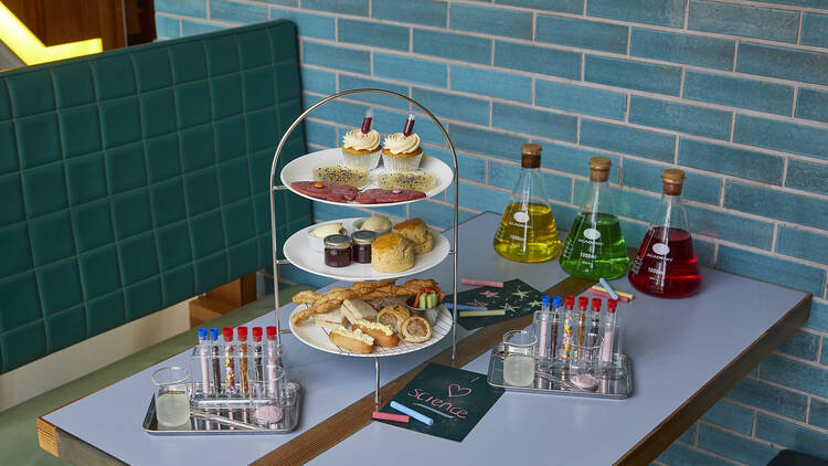 Afternoon tea set with various scientific elements 