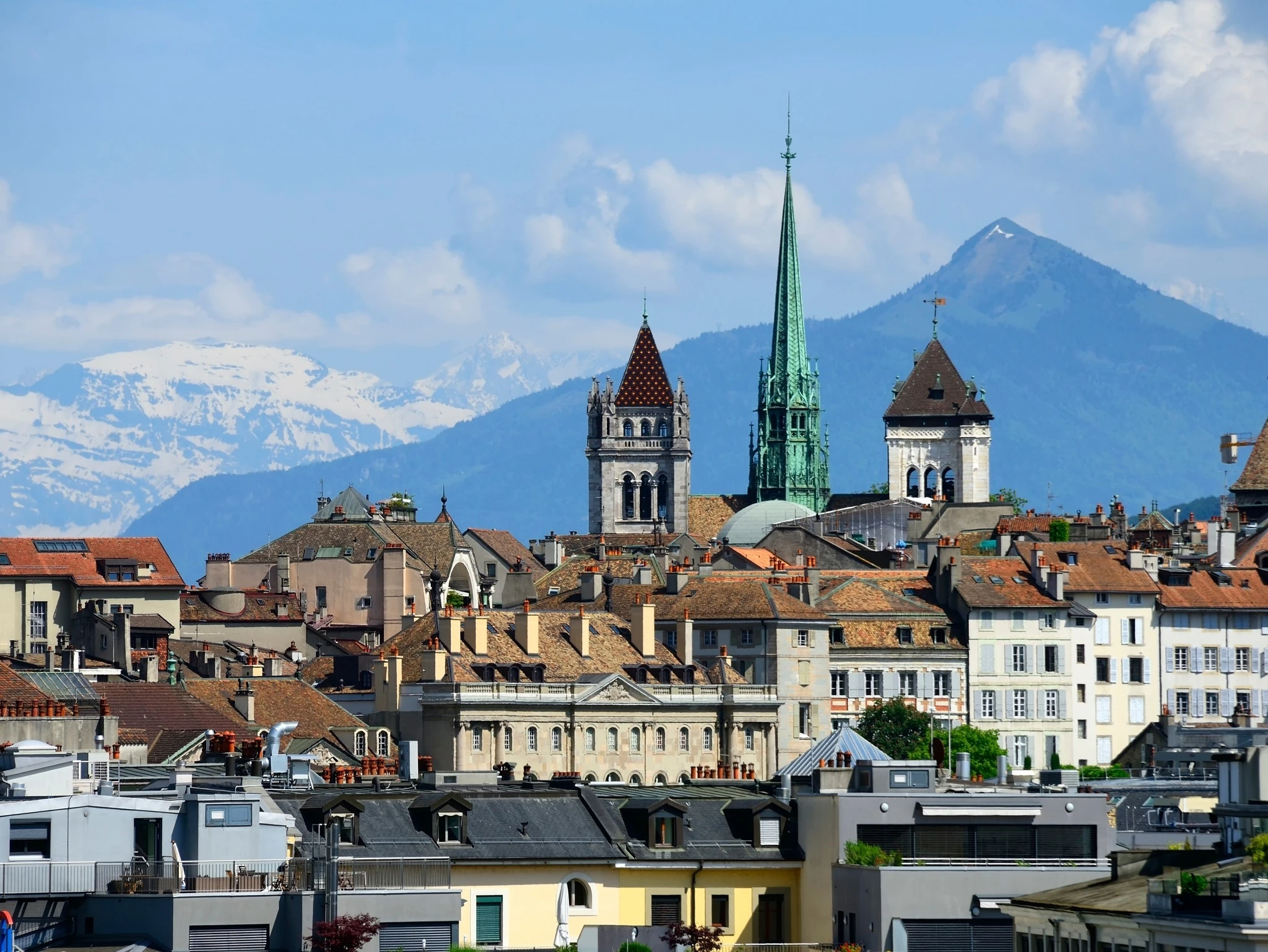 Geneva, Switzerland, Europe - view for Saint Pierre Cathedral towers - main landmark of the city and surrounding historic buildings of old town