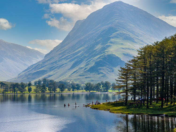 Beautiful lake of Buttermere surrounded by green hill in England's Lake District