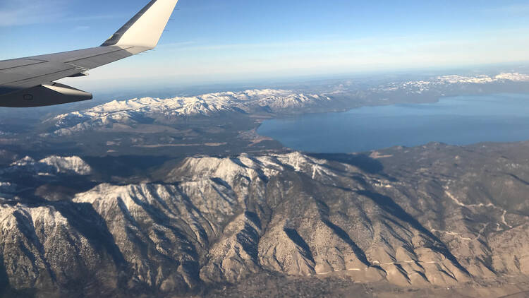 Airplane over mountains