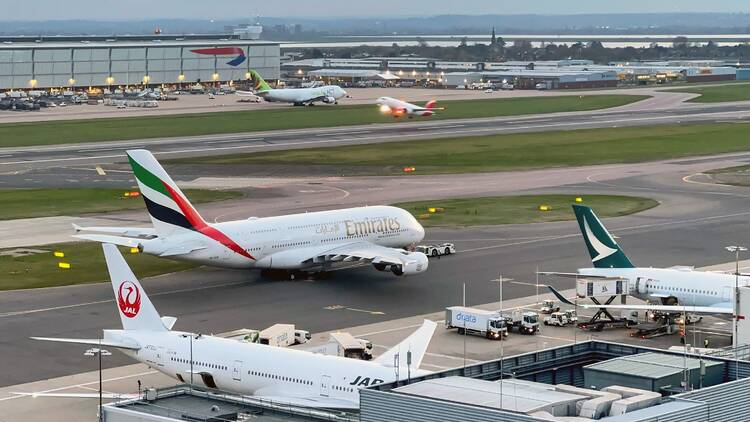 London Heathrow airport with planes on the runway