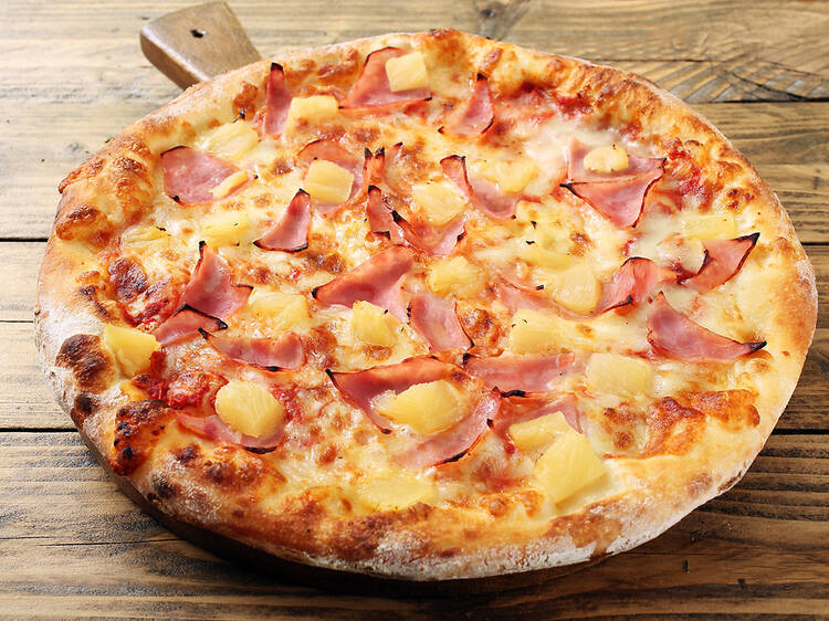 A Norwich restaurant has started charging £100 for pineapple on pizza