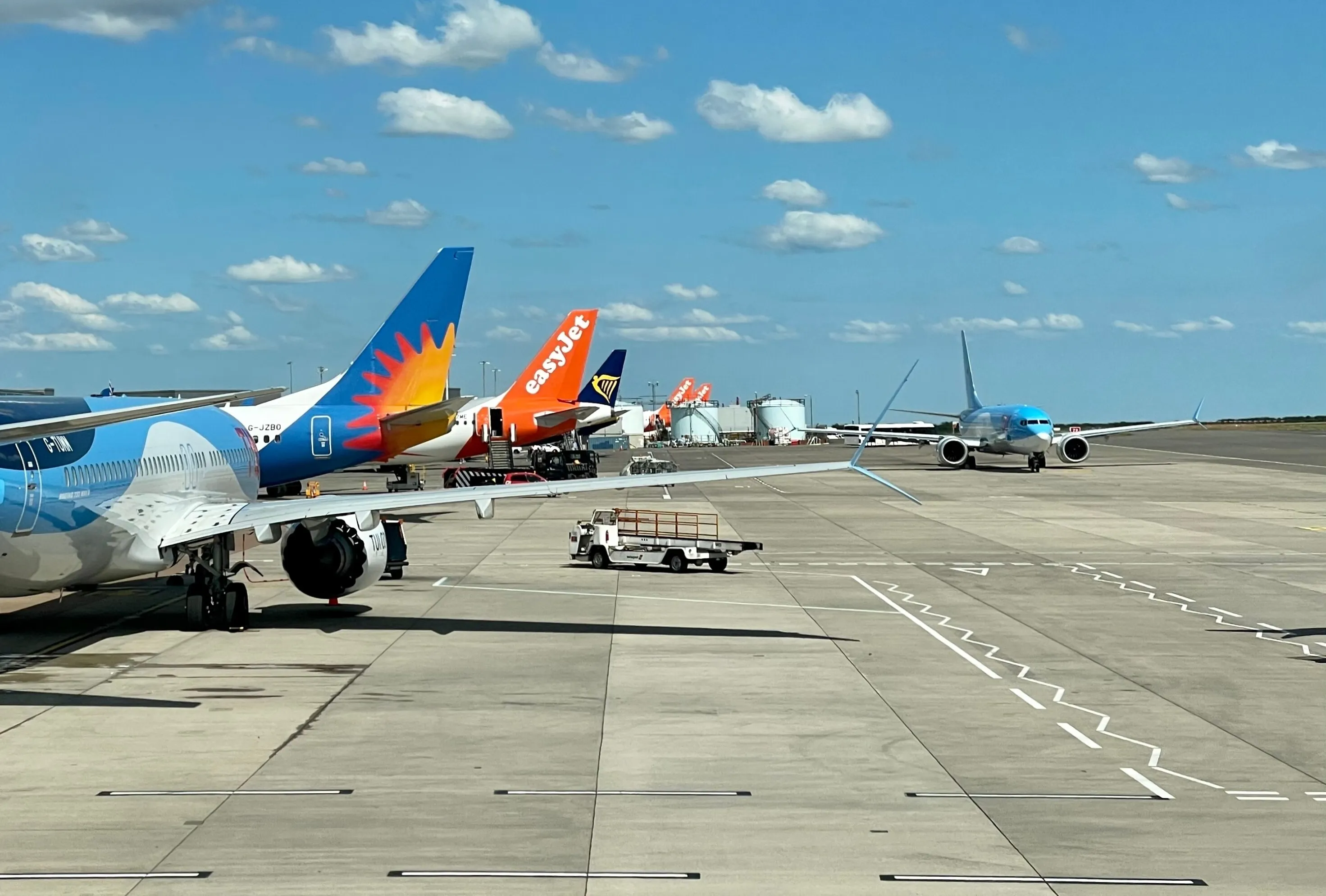 Planes on a runway with easyJet, Ryanair and Jet2
