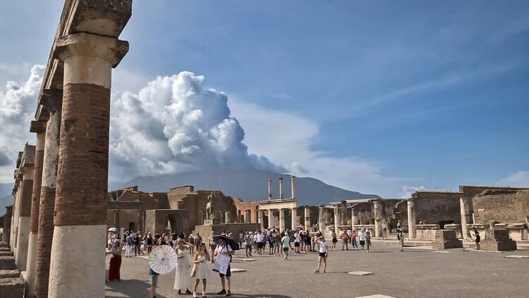 Tourists exploring Pompeii, Italy