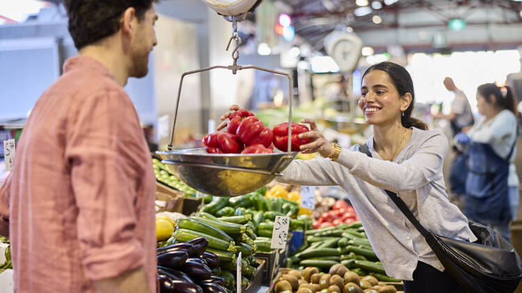 A woman and man at a grocery market