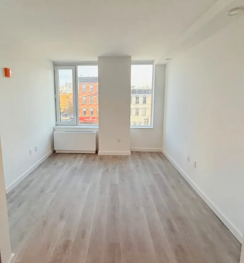 living room of Douglass Street affordable apartment lottery