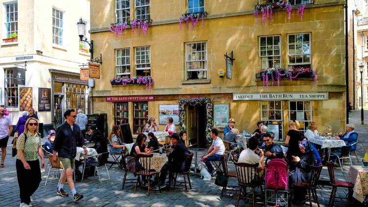 Bath in England with people sitting outside and eating