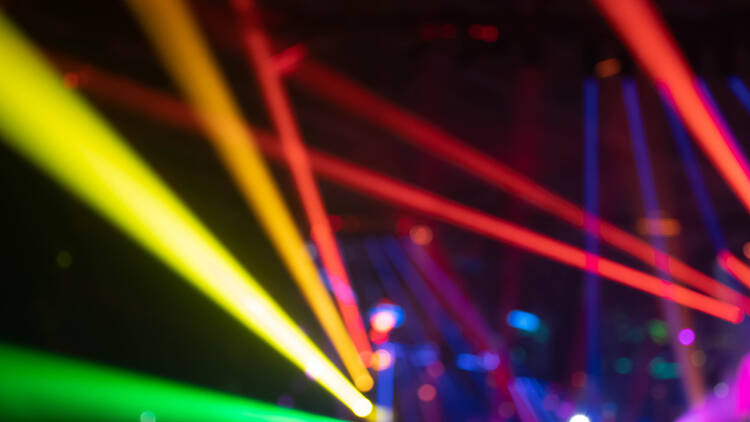 Image of a club with multi-coloured lights