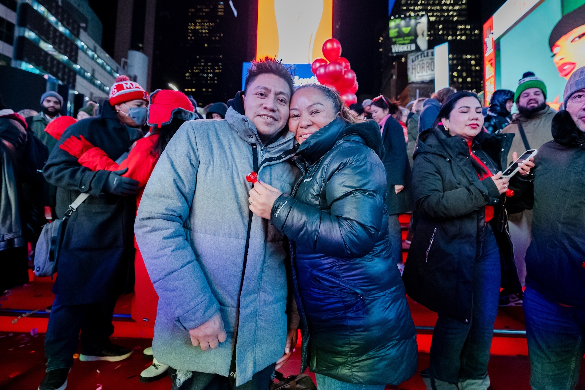 A couple renews their vows in Times Square.