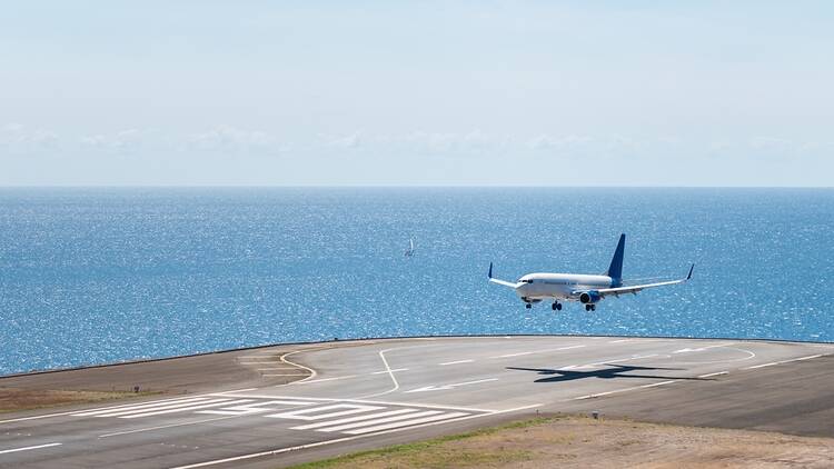 Aeroplane landing at Madeira Airport