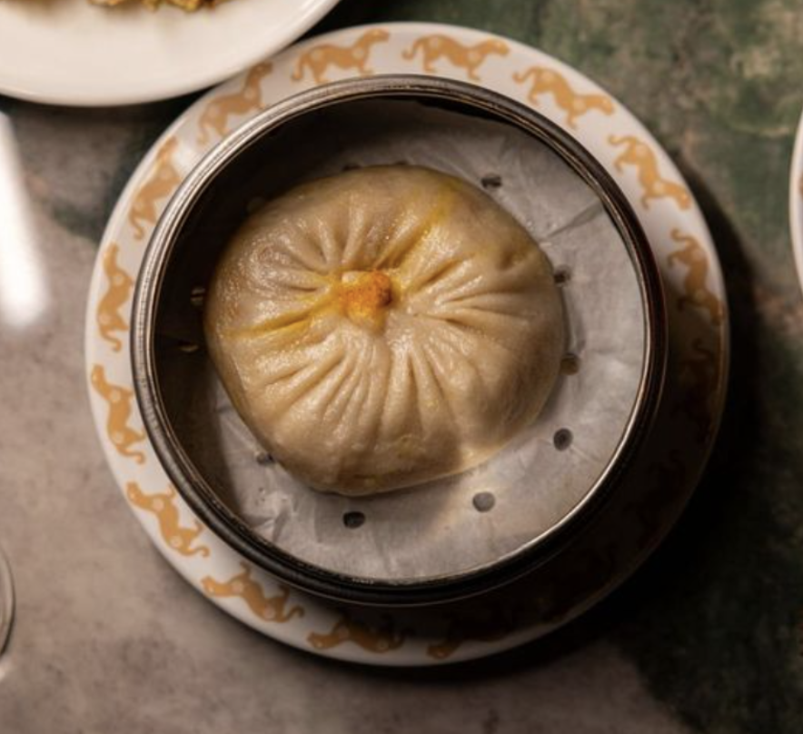 Usa straws to eat a soup dumpling the size of your face at this massive new Asian restaurant in Tribeca
