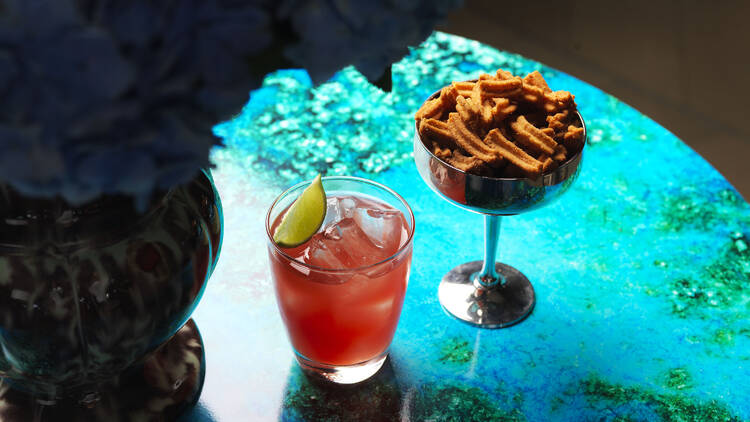 Cocktail and snacks at Icebergs Harbour Bar