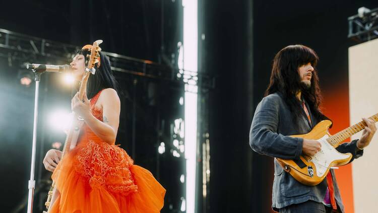 Laura Lee and Mark Speer of Khruangbin on stage. 