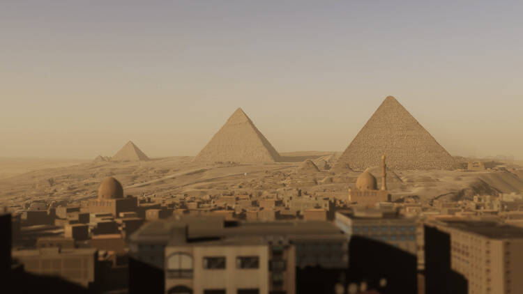 A digital rendering of the Giza plateau with several pyramids.