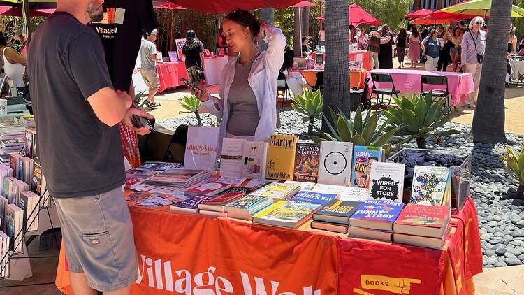 A table with books at the Culver City Book Festival.