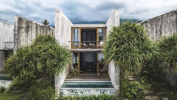 A Brutalism-inspired ocean-view pool villa