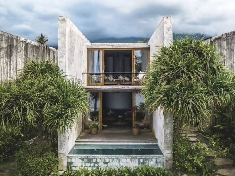 A Brutalism-inspired ocean-view pool villa