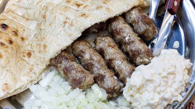 A plate of Balkan street food from the Cevapi Project.