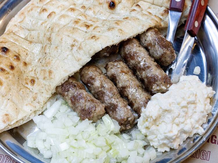 A plate of Balkan street food from the Cevapi Project.