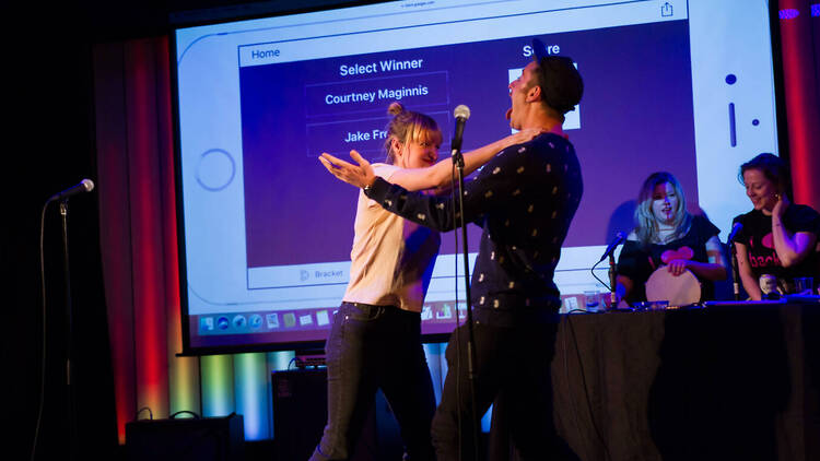 two comedians on stage two comedians on stage