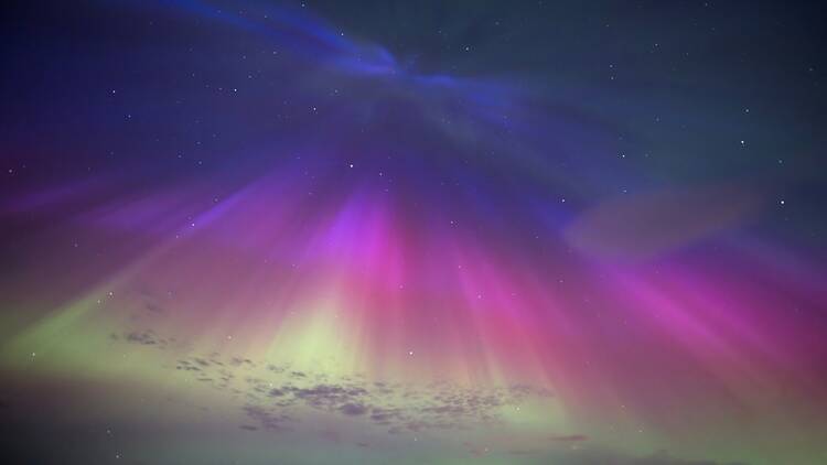 Aurora borealis, or northern lights, in the sky in Scotland