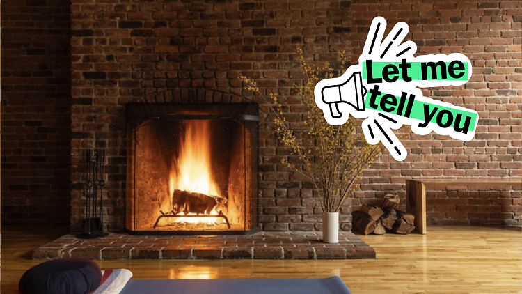 New Vibe Yoga’s fireplace with the let me tell you badge on it