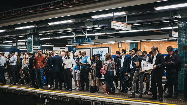 Crowd of commuters on the platform at Moorgate tube station, London