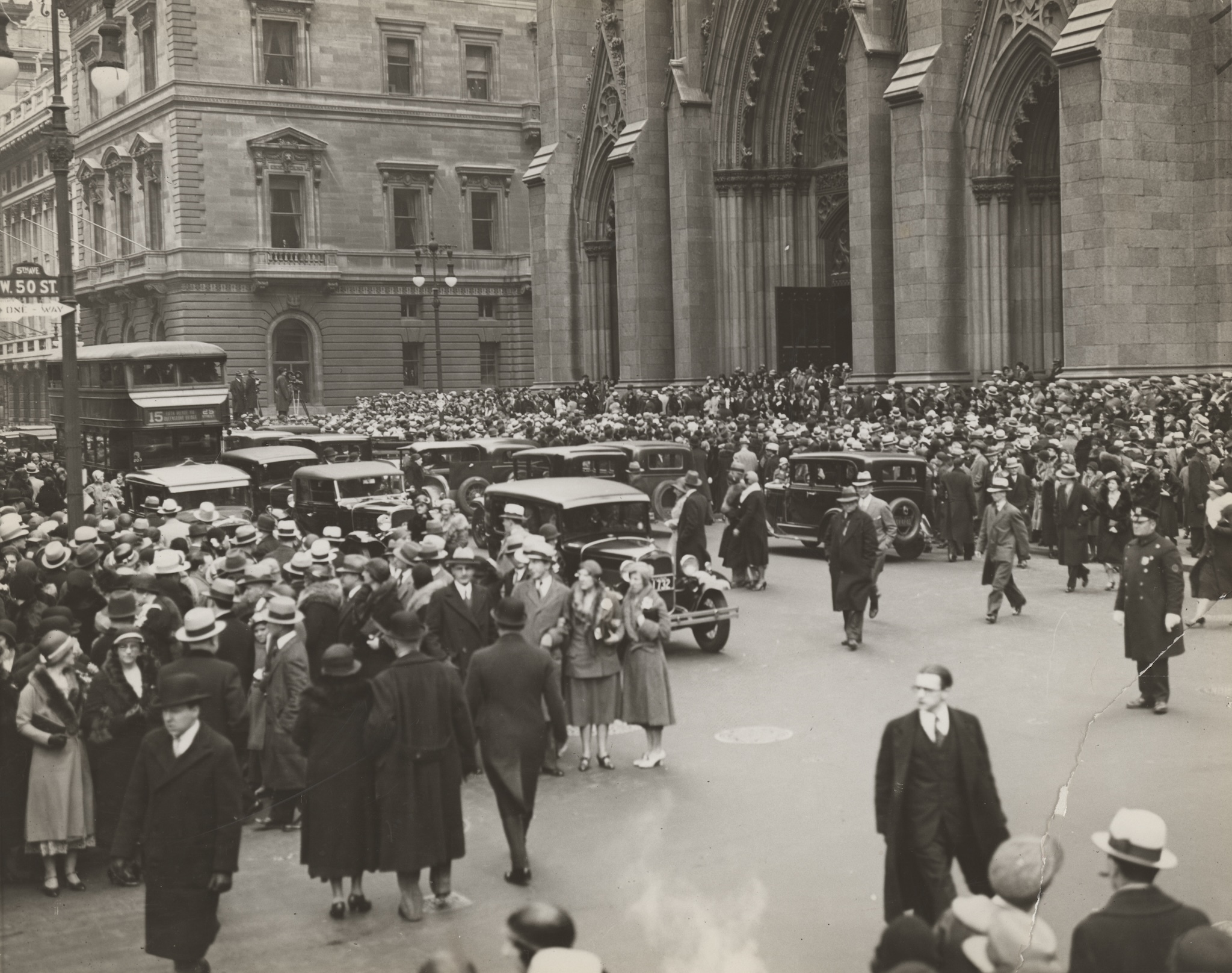 A crowd gathered outside St. Patrick's Cathedral in the 1920s.