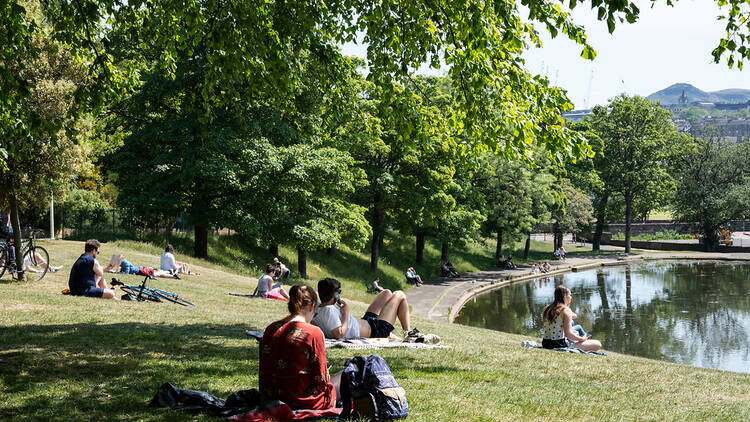 People sunbathing in Scotland