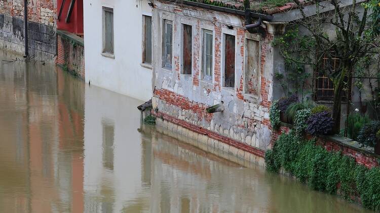 A house engulfed in flood water